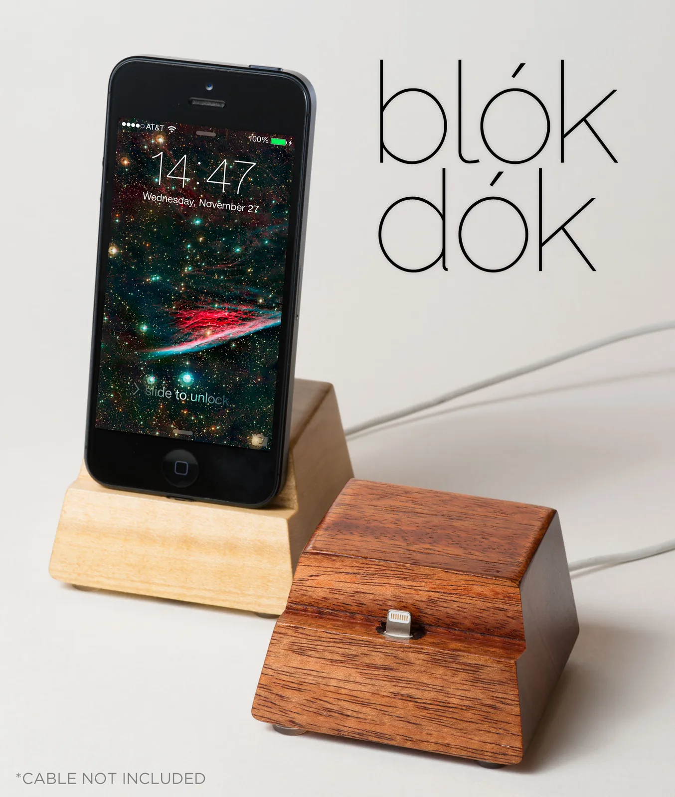 Two Blok Dok docks, maple and mahogany, with an iPhone 5 and the blók dók logotype
